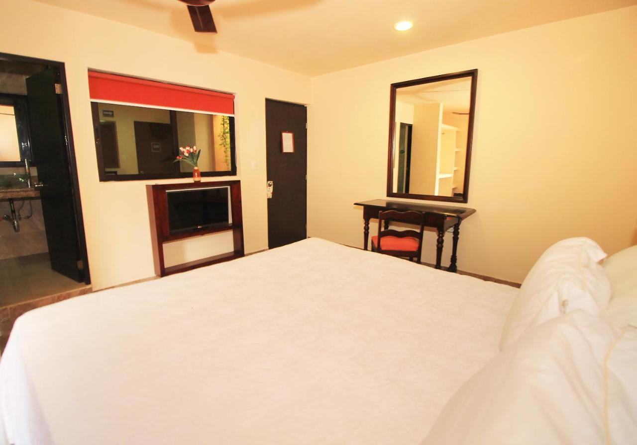 Papagayo Hotel Boutique ปลายาเดลการ์เมน ภายนอก รูปภาพ A room at the hotel