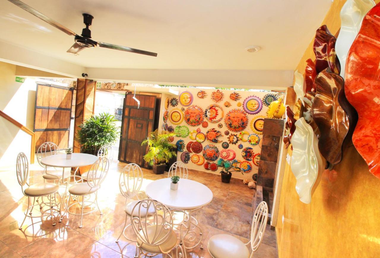 Papagayo Hotel Boutique ปลายาเดลการ์เมน ภายนอก รูปภาพ The interior of the gallery