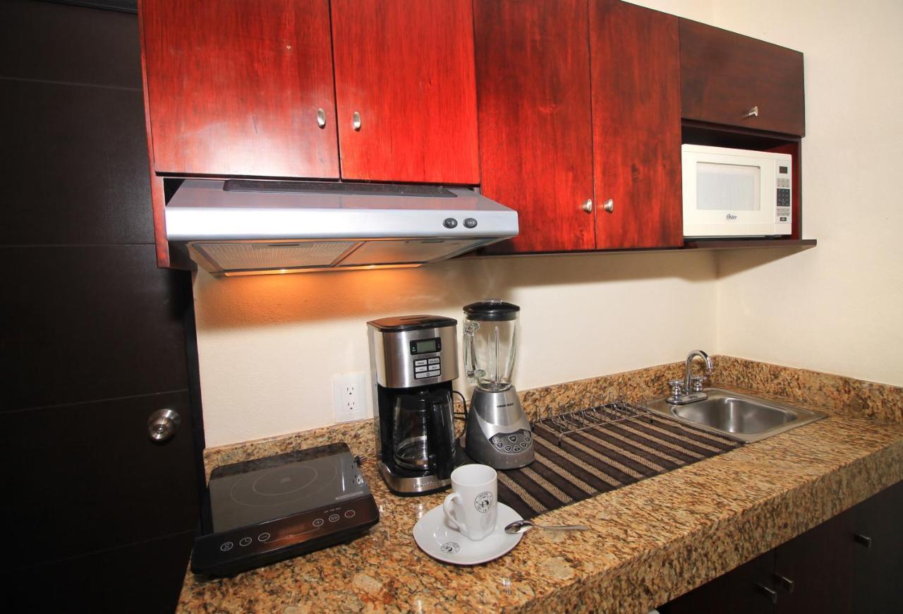 Papagayo Hotel Boutique ปลายาเดลการ์เมน ภายนอก รูปภาพ A coffeemaker in a kitchen