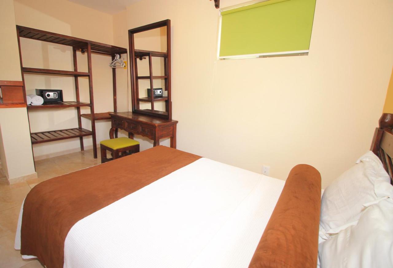 Papagayo Hotel Boutique ปลายาเดลการ์เมน ภายนอก รูปภาพ A bedroom at the hotel