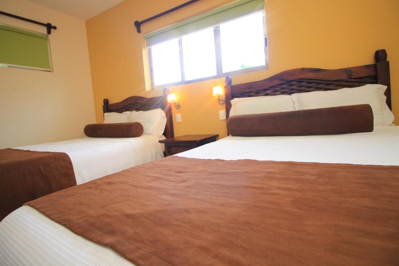 Papagayo Hotel Boutique ปลายาเดลการ์เมน ภายนอก รูปภาพ A room at the hotel