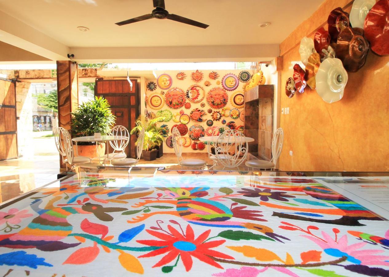 Papagayo Hotel Boutique ปลายาเดลการ์เมน ภายนอก รูปภาพ A floor painted with the technique